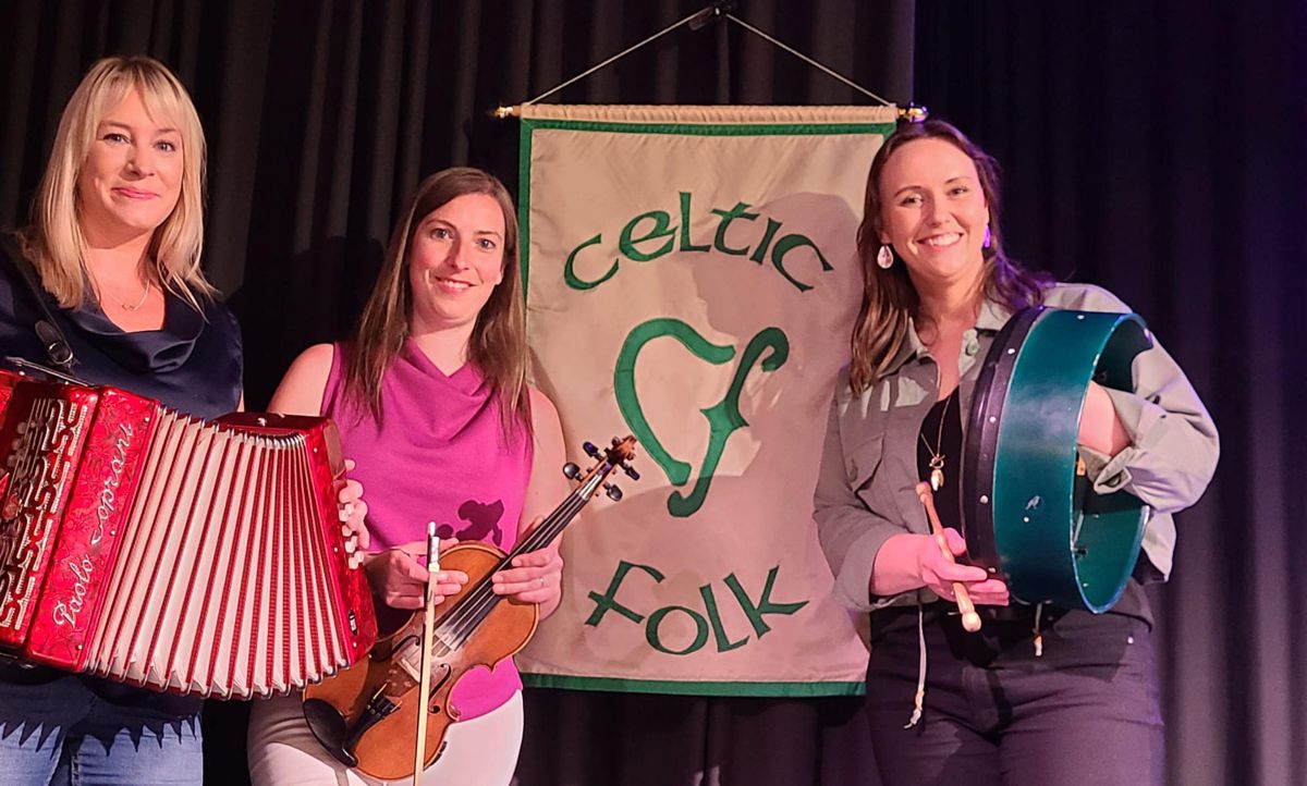 The Drowsy Maggies on the stage at the Irish Cultural Society.